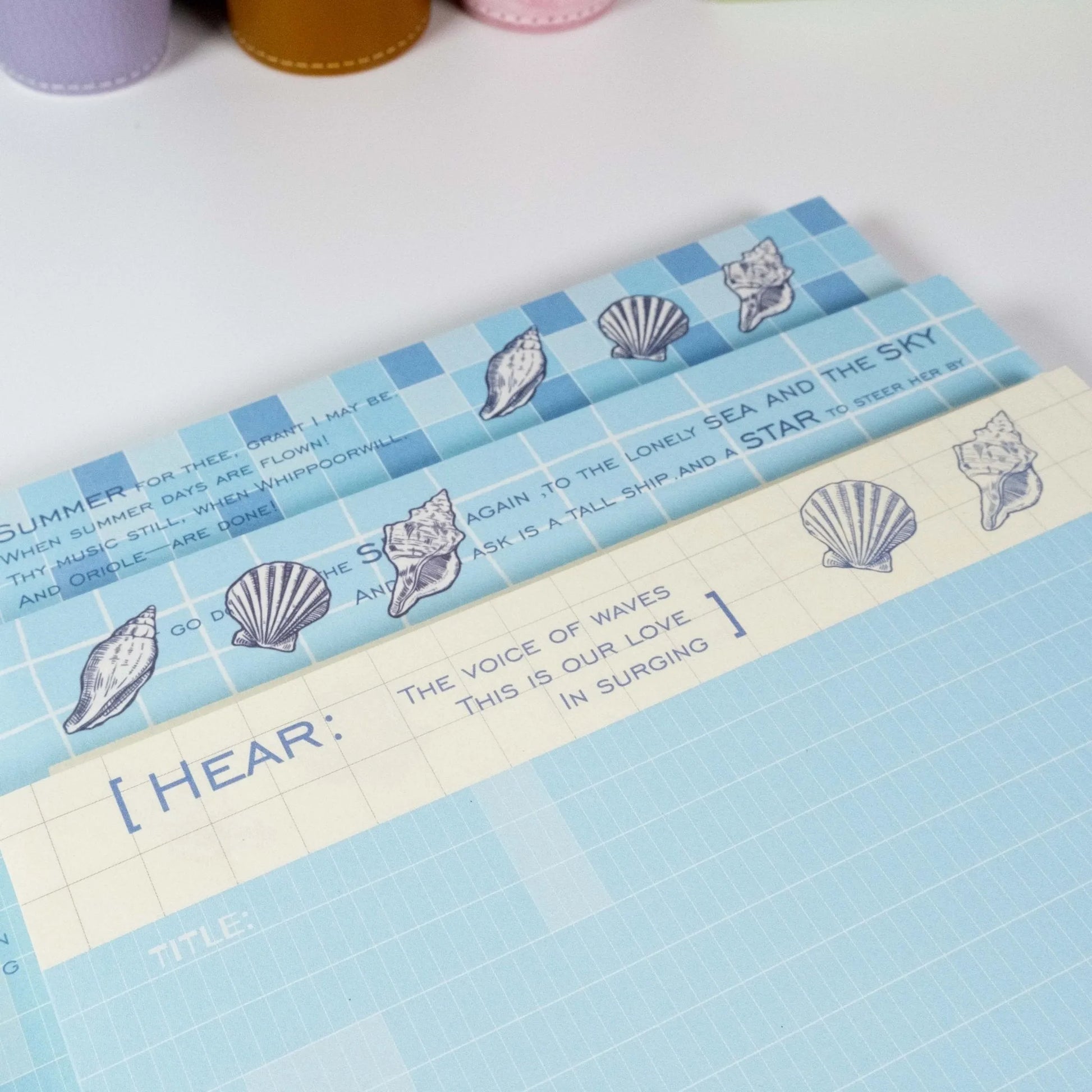 Close-up of seashell and ocean-inspired header design on Summer Beach notepad - Miouva