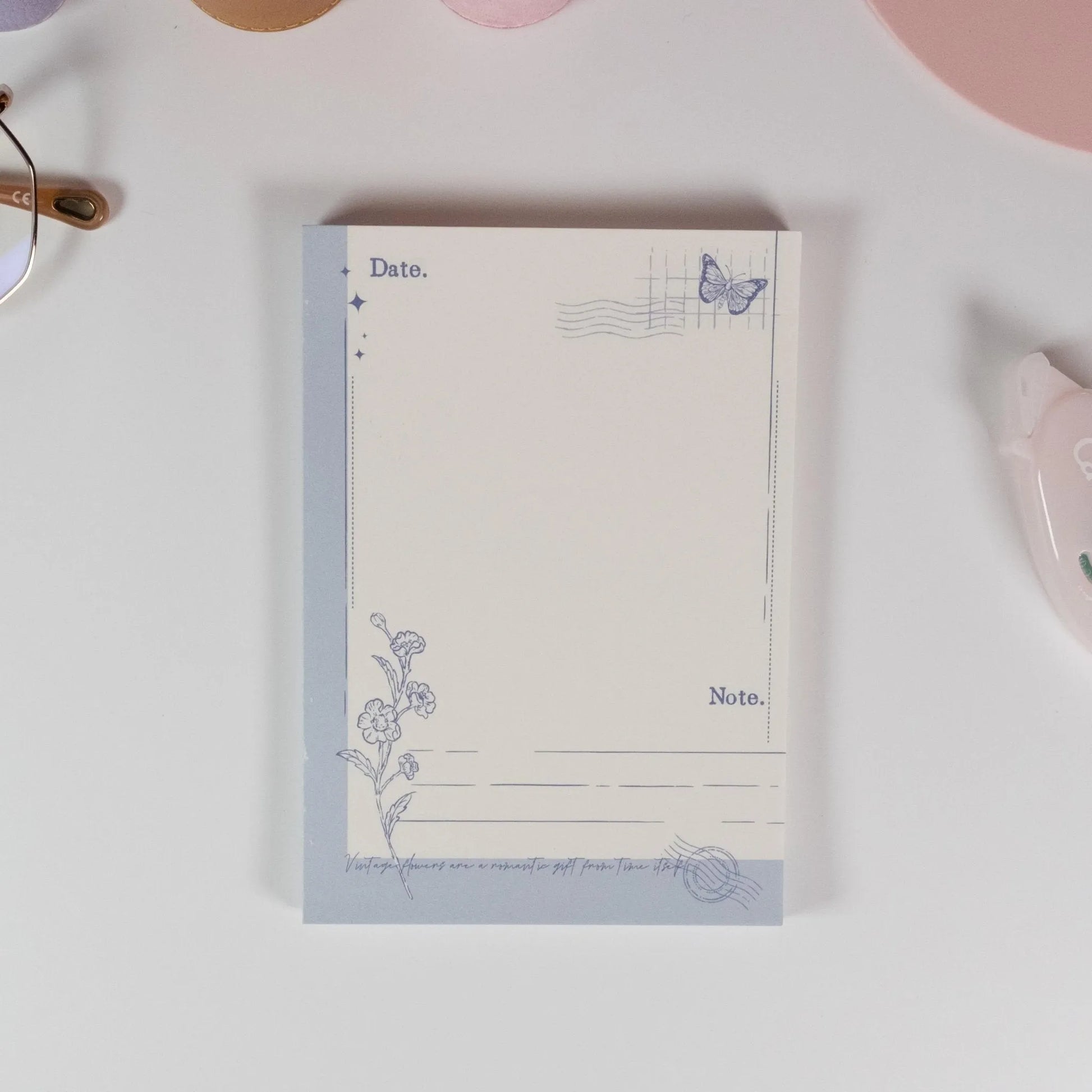 Petal Postmark variant of Butterfly and Flower A6 notepad with vintage butterfly stamp design - Miouva