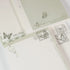 Close-up of butterfly stamp details and poetic typography on Butterfly Dreams paper - Miouva