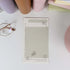 Close-up of punched planner refill with butterfly stamp artwork - Miouva