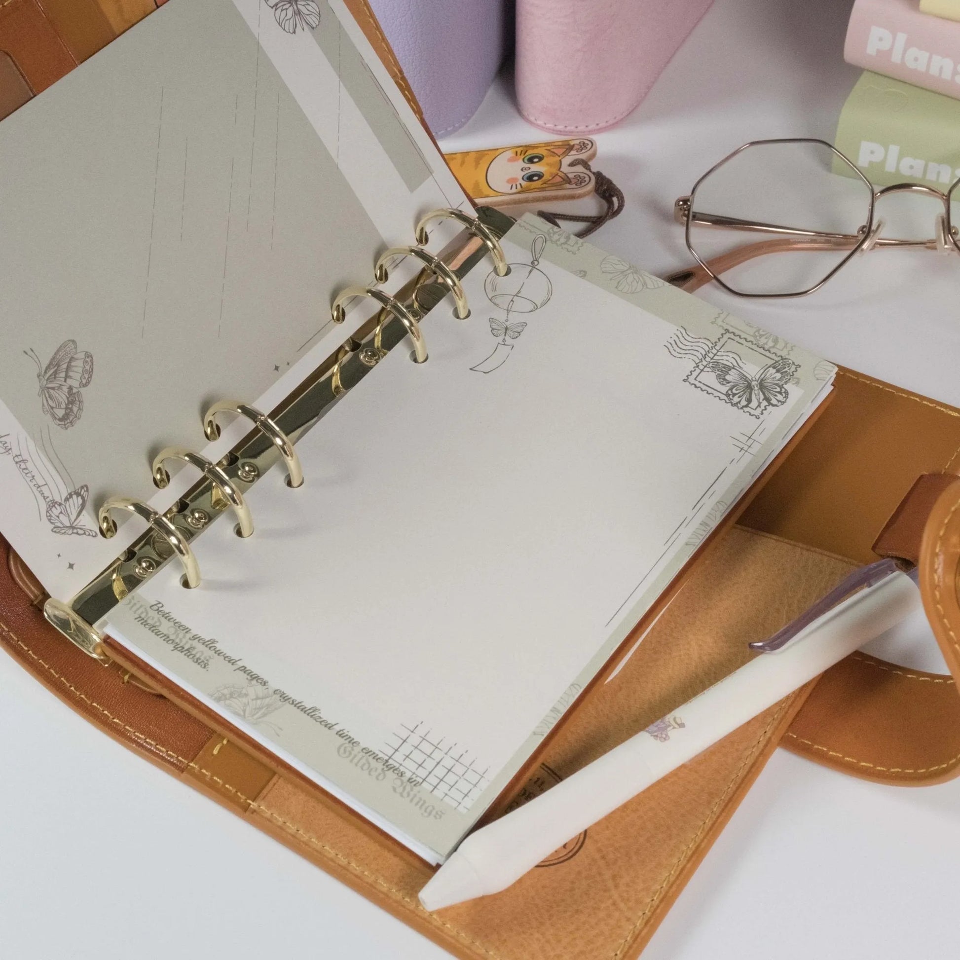 Personal size planner refills from Butterfly Dreams collection inside a 6-ring binder - Miouva