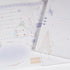 Detailed view of Little Chirp Notepad artwork featuring delicate bird drawings and fine linework - Miouva