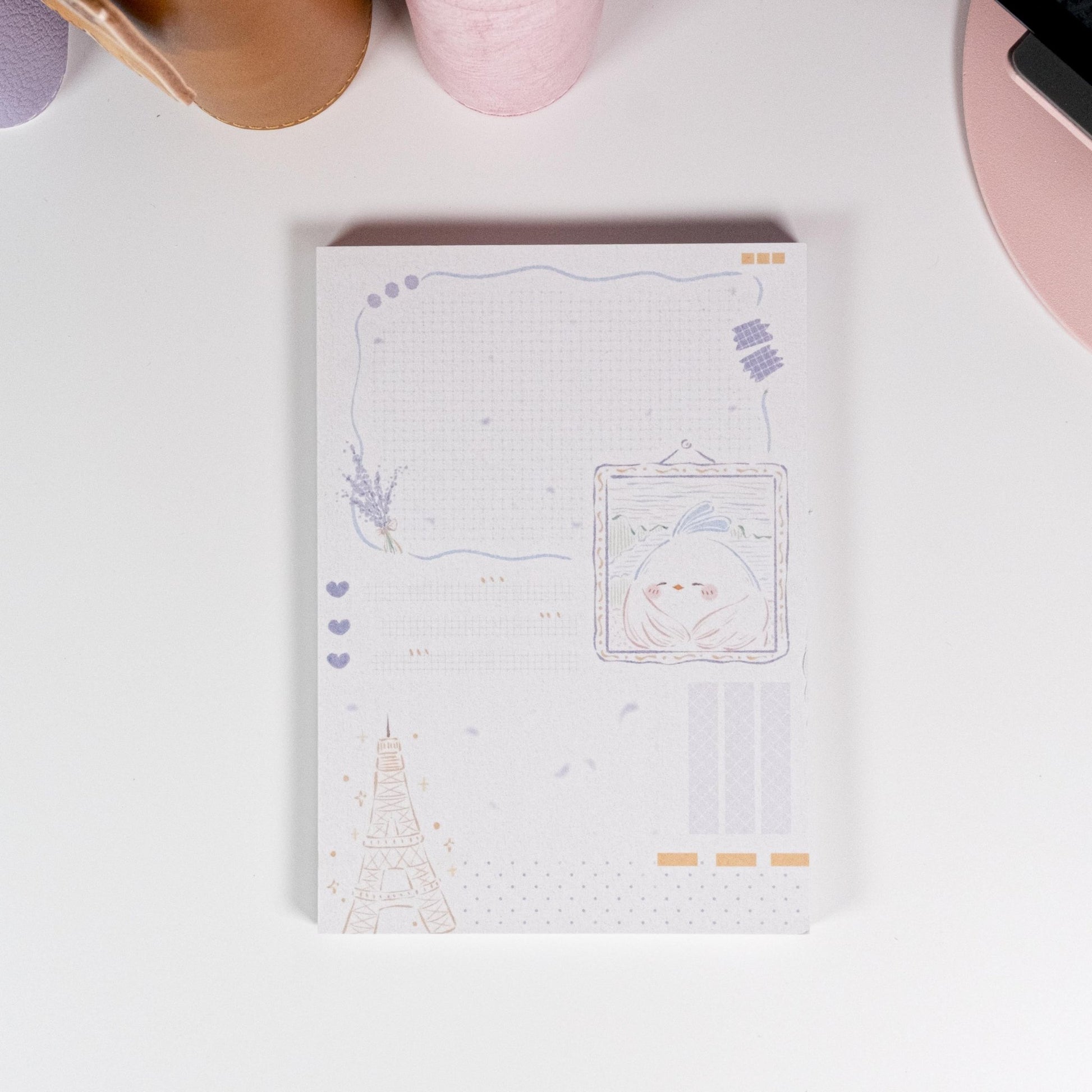 Little Chirp A6 Notepad featuring hand-drawn Eiffel Tower and bird illustration in soft pastel tones - Miouva
