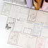 Flat lay of Lilith’s Stamp Memo Pad showing triple-section pages and artistic hand-drawn layout - Miouva