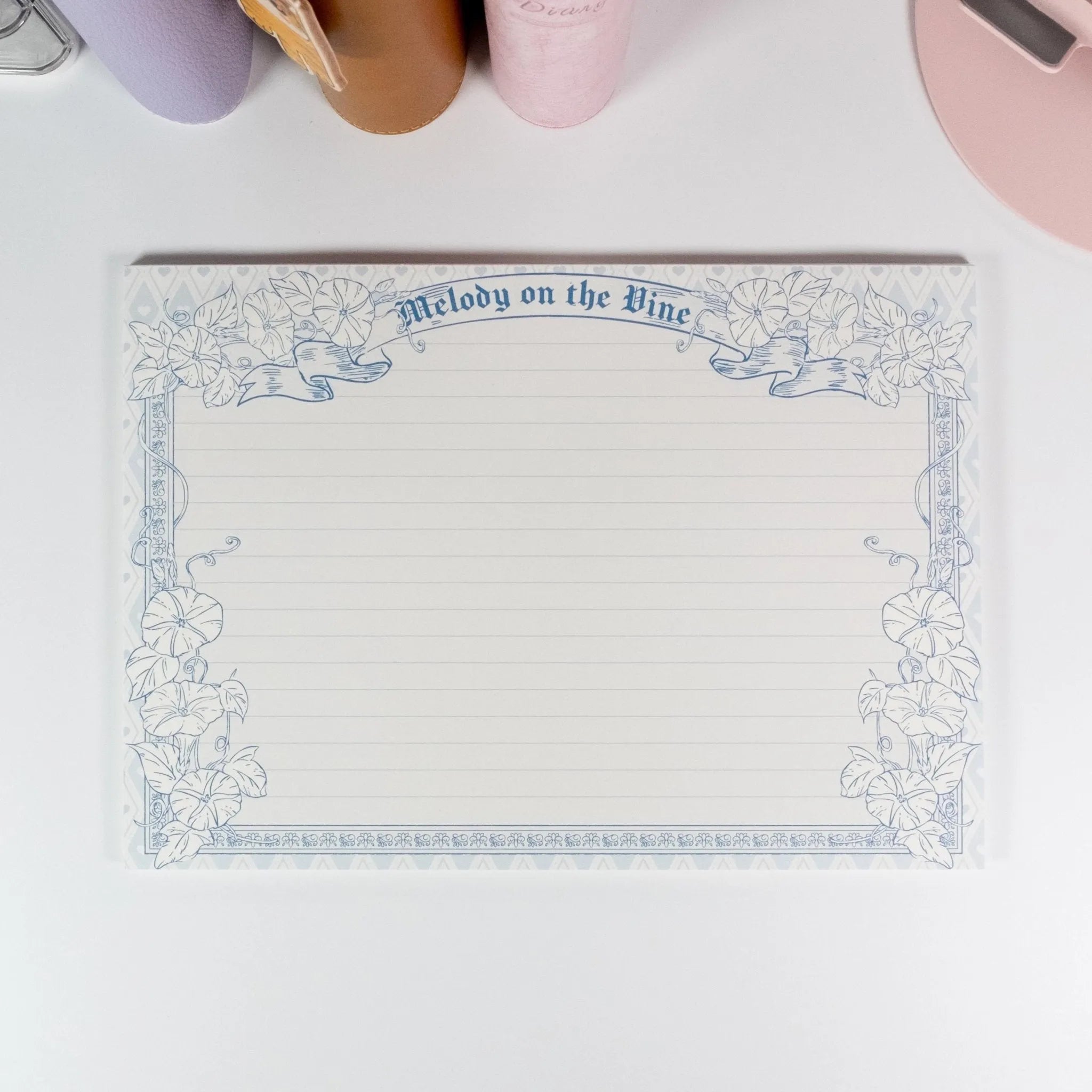Horizontal lined variant of Morning Glory B5 notepad displayed on desk - Miouva