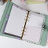 Pink & Ink Planner Refills displayed inside a personal planner binder showing black and pink contrast design - Miouva