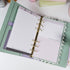 Pink & Ink Planner Refills displayed inside a personal planner binder showing black and pink contrast design - Miouva