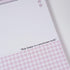Close-up of Pink & Ink Planner Refills highlighting smooth FSC paper texture and elegant black-pink printing - Miouva