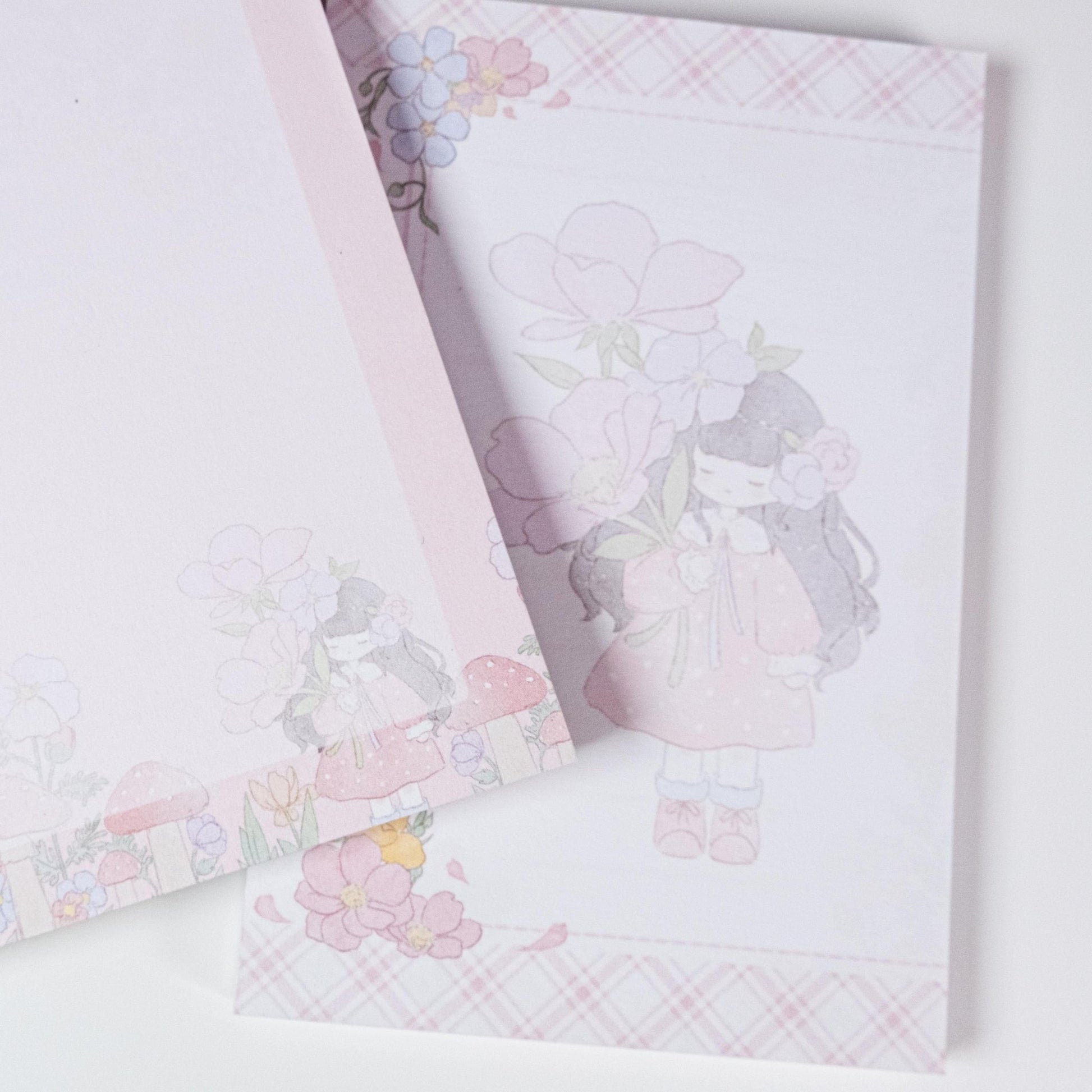 Detailed view of Pink Primrose Planner Refills, highlighting double-sided printing and elegant floral borders - Miouva