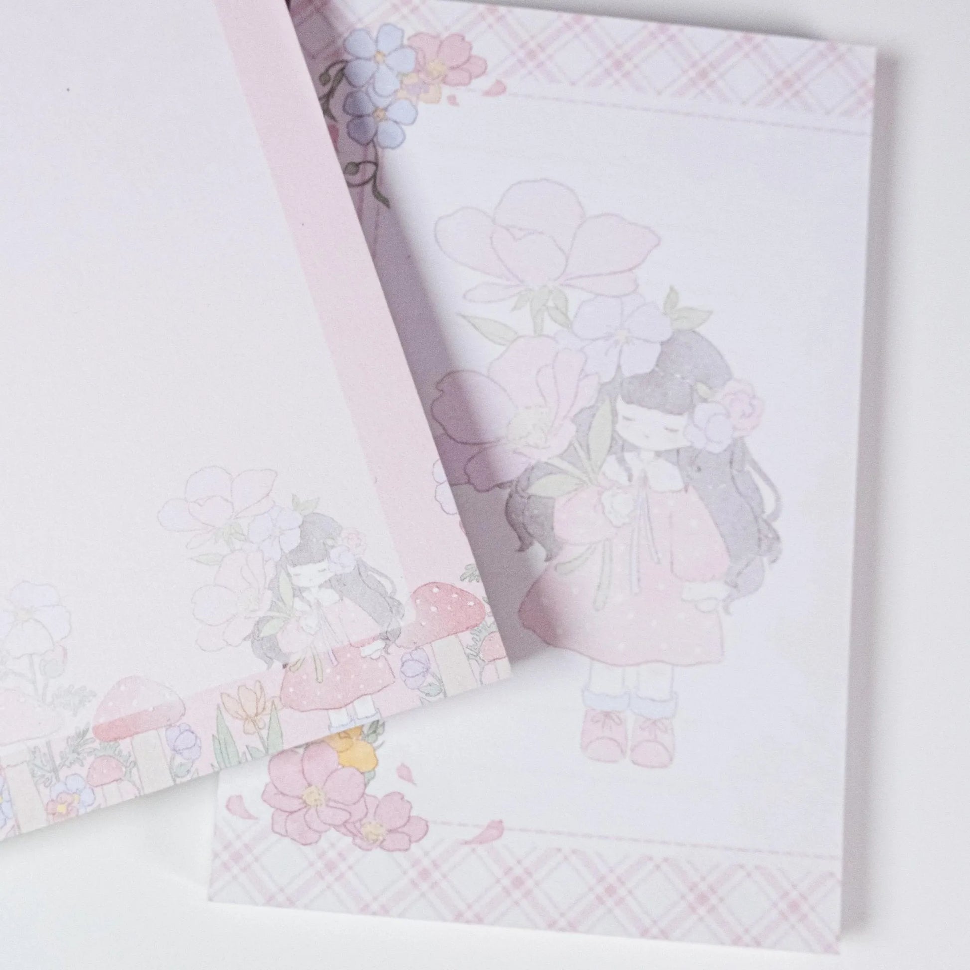 Detailed view of Pink Primrose Planner Refills, highlighting double-sided printing and elegant floral borders - Miouva