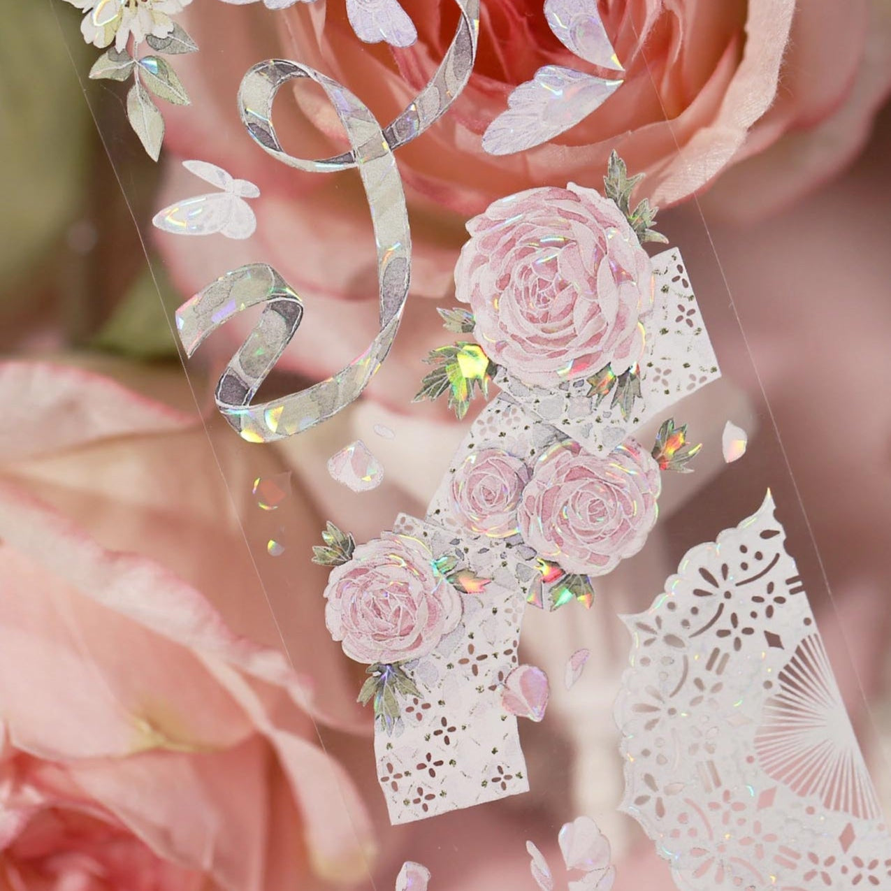 Close-up of pink floral PET tape showing holographic shimmer and delicate details - Miouva