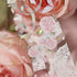 Close-up of pink floral PET tape showing holographic shimmer and delicate details - Miouva