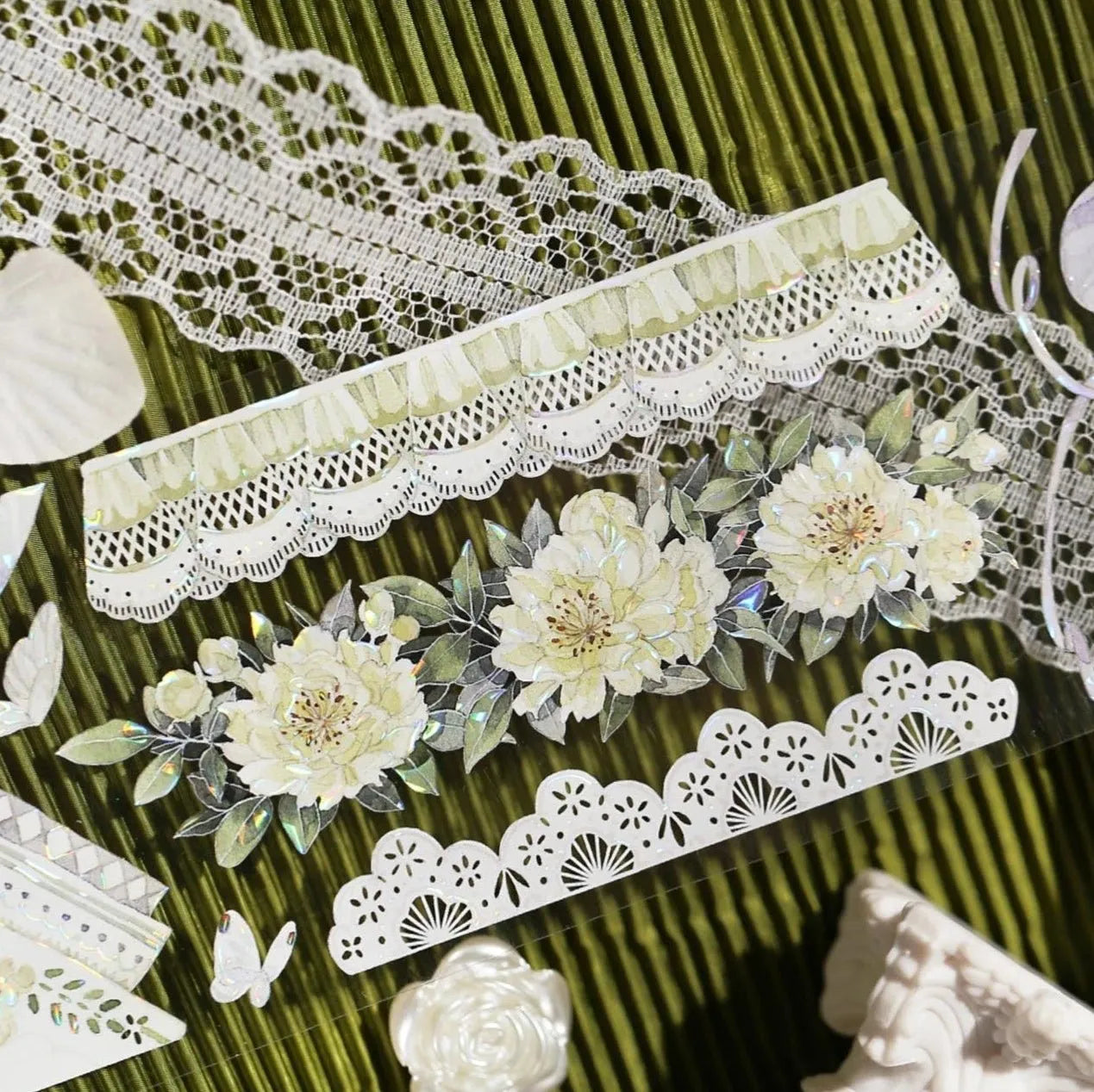 Soft Weave holographic floral tape by Shine Studio displayed with lace and roses - Miouva