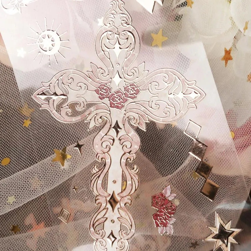 Cross motif detail from Inseason Studio’s Starlit Curtain PET Tape with holographic shimmer and rose accents - Miouva