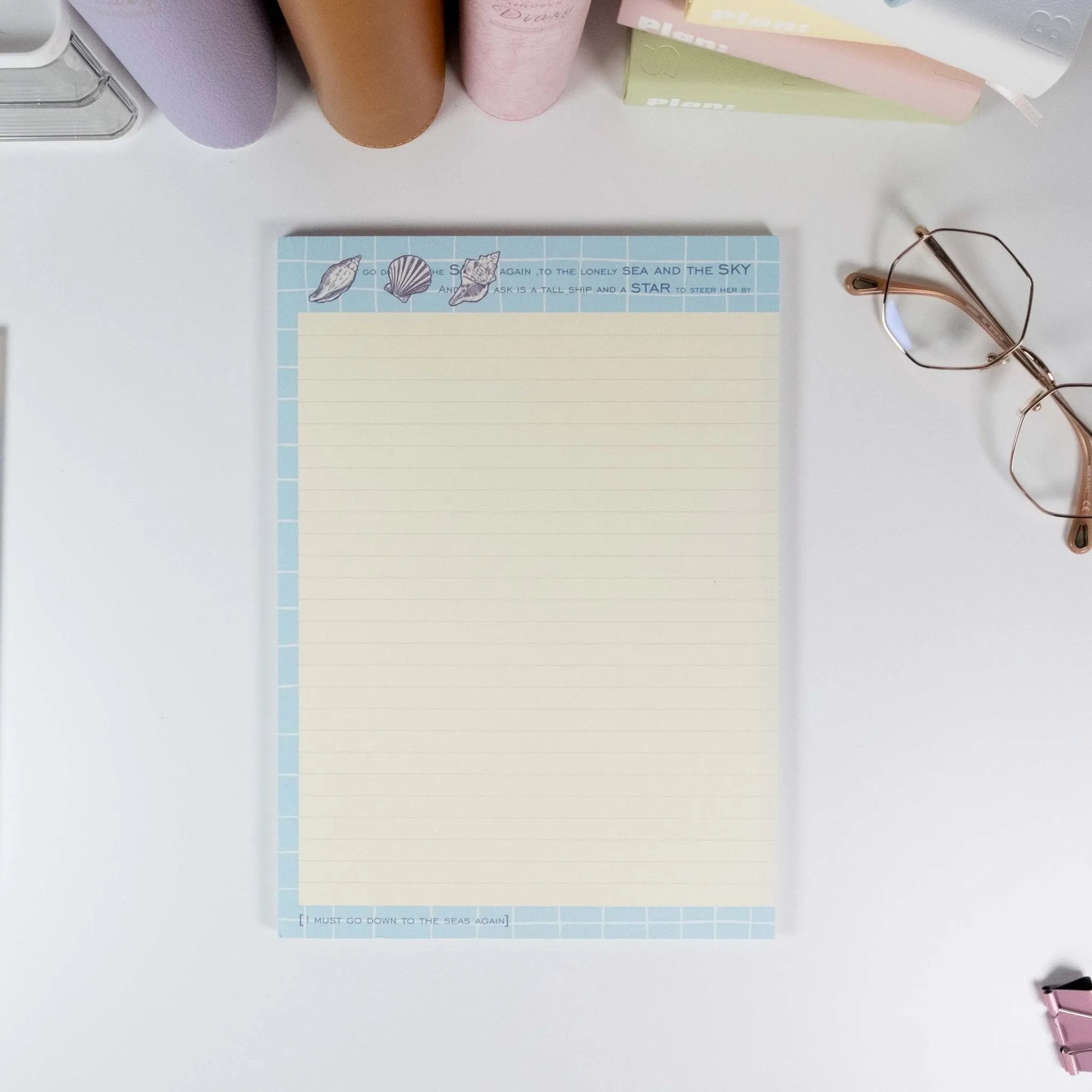 Soft blue stationery with minimal marine details and smooth paper texture - Miouva