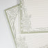Close-up of Thorn Rose notepad paper texture and rose illustration details - Miouva