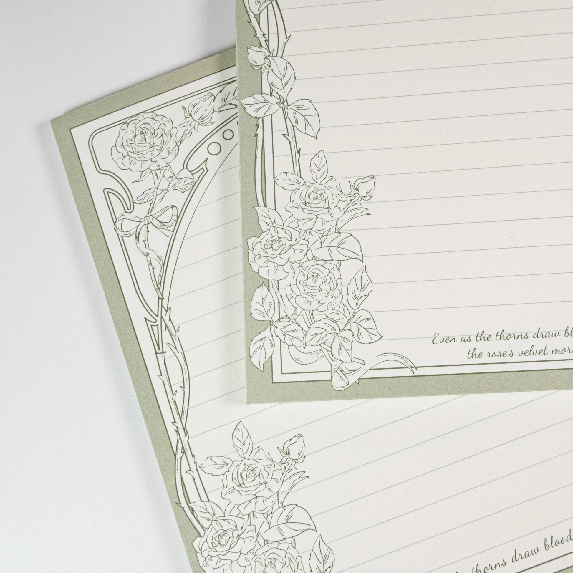 Close-up of Thorn Rose notepad paper texture and rose illustration details - Miouva