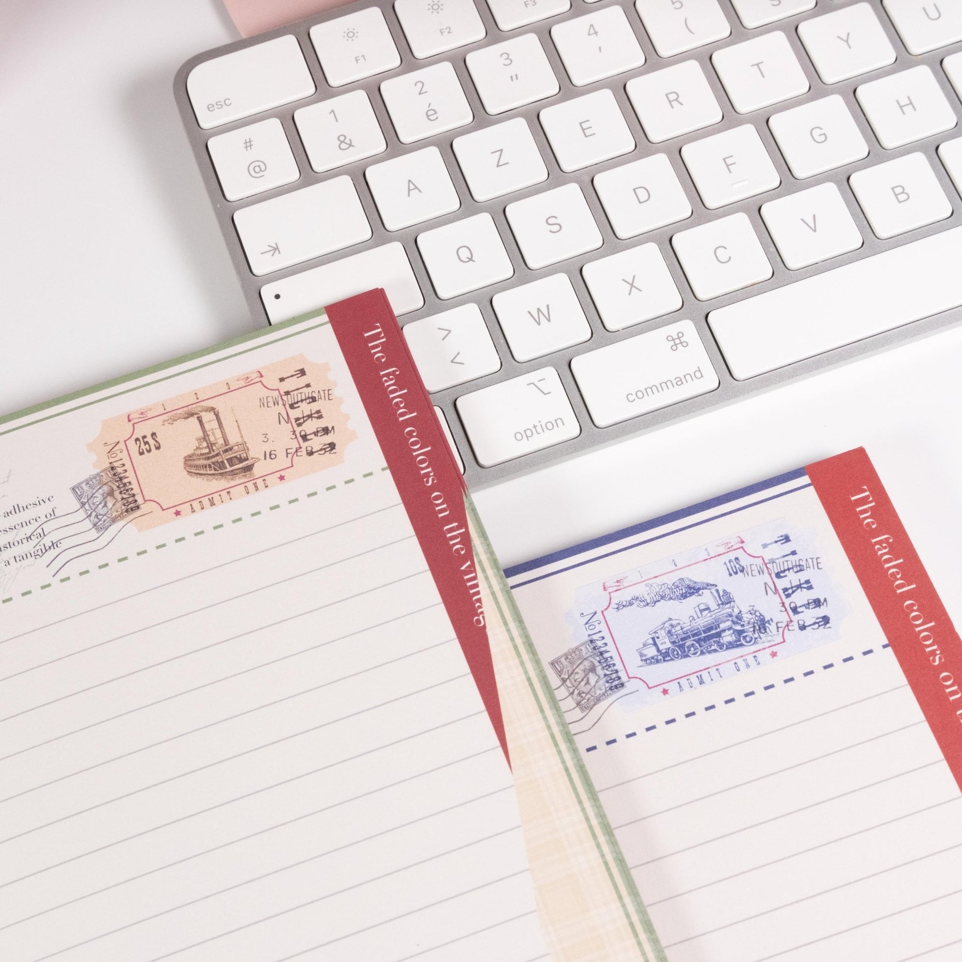 Close-up of Vintage Train Notepad highlighting hand-drawn postage marks, textured paper, and fine ink details - Miouva