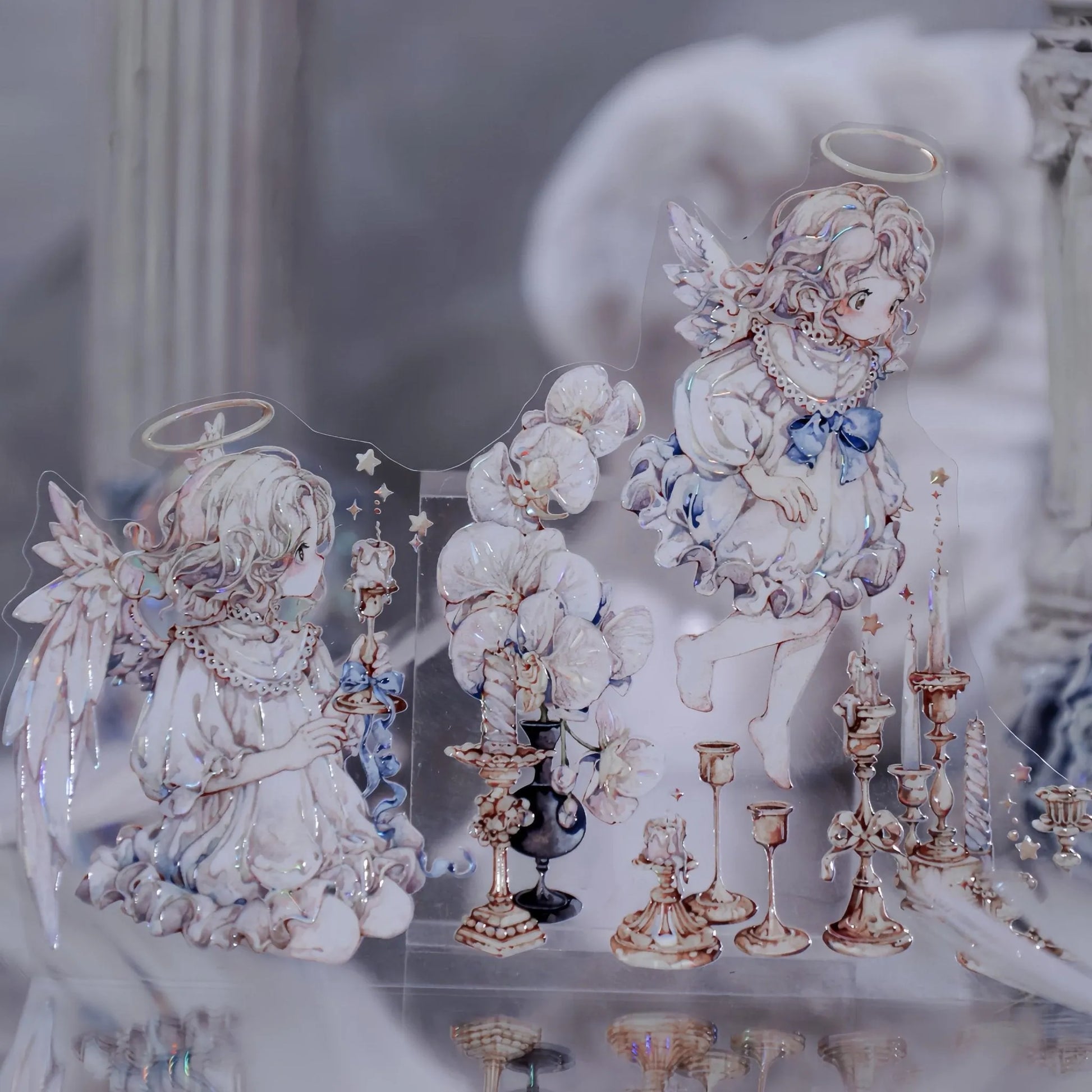 Close-up of Blue Angel PET Tape featuring a small angel holding a candle with gentle light reflection - Miouva