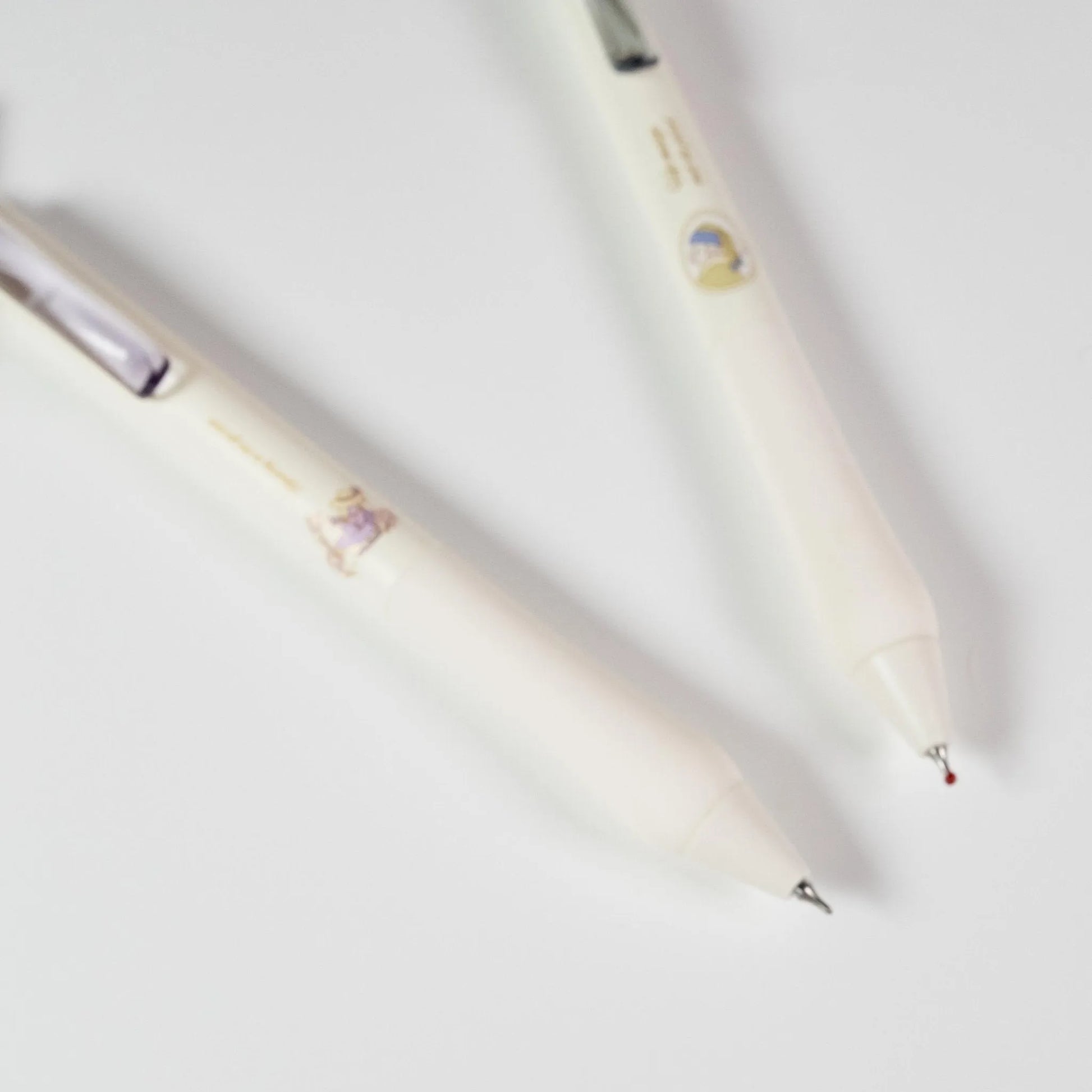 Close-up of Classic Art Bunny Gel Pen tip and removable silicone grip showing fine detail and comfort design - Miouva