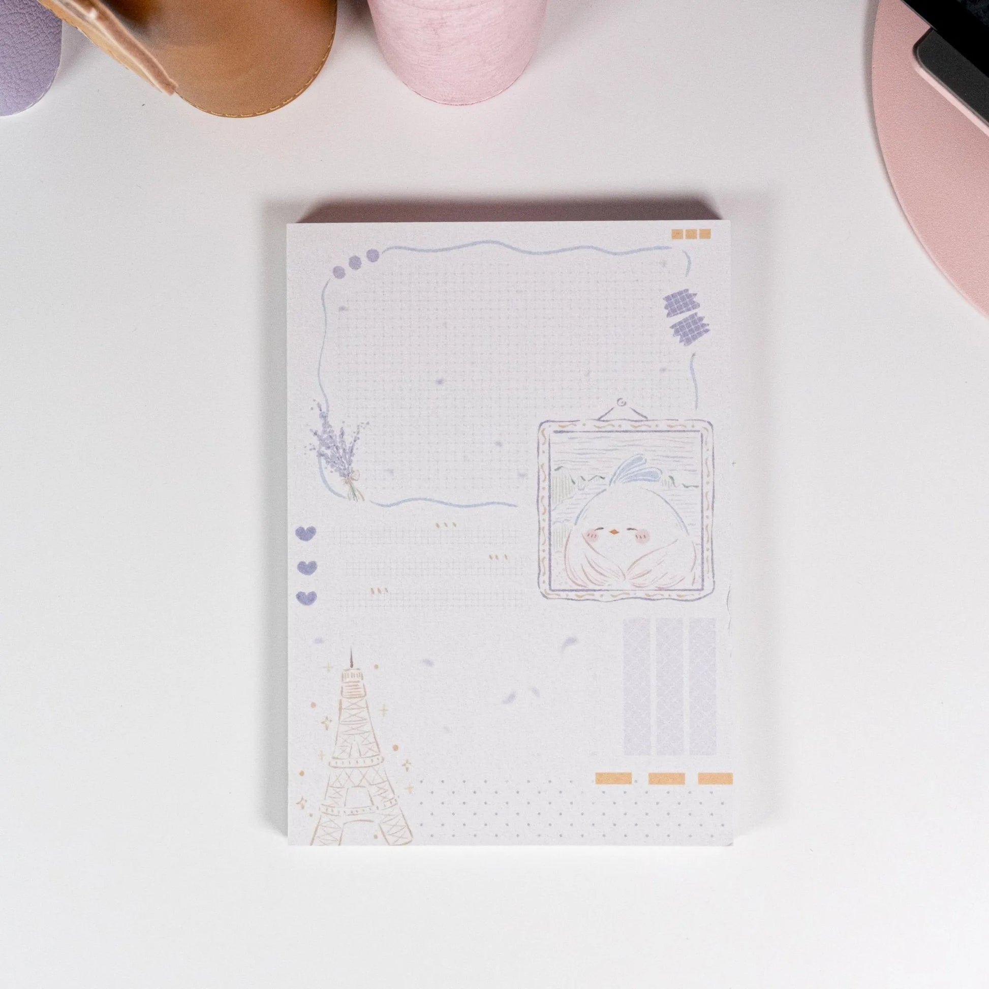 Little Chirp A6 Notepad featuring hand-drawn Eiffel Tower and bird illustration in soft pastel tones - Miouva